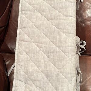 Pottery Barn Kids gray linen crib pads